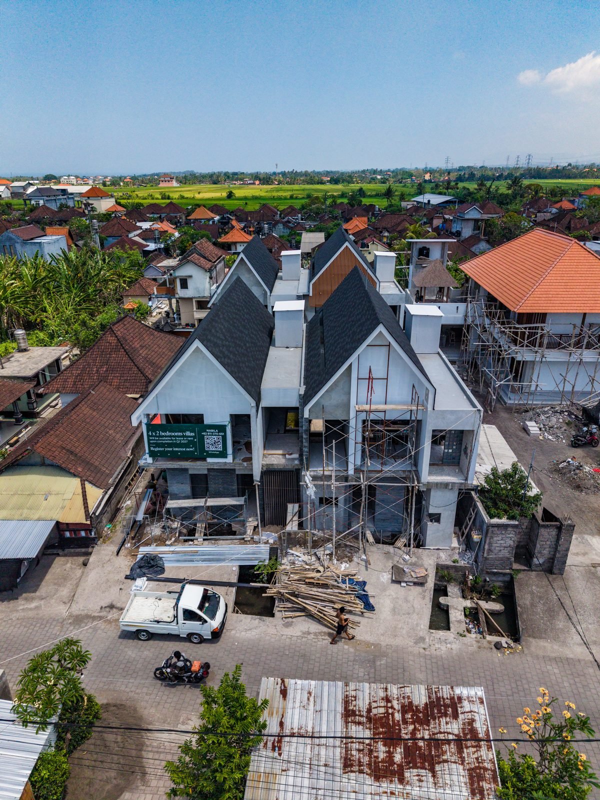 The Four Palms front elevation under construction with the project site board, 22 September 2026
